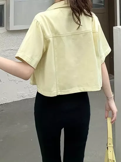 Şehirli Tarzda Yırtmaçlı Bej Kadın Kısa Jean Ceket